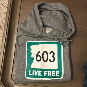 Men’s XL “603 Live Free” sweatshirt. Never been worn. $35